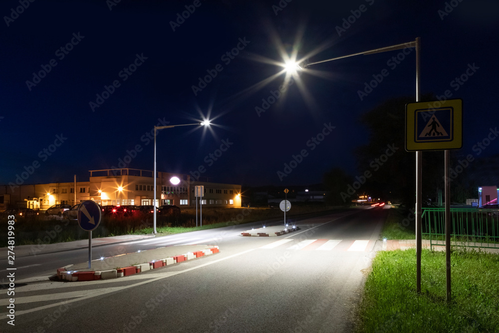modern LED streetlights on pedestrian crossing at night modern LED streetlights on pedestrian crossing at night