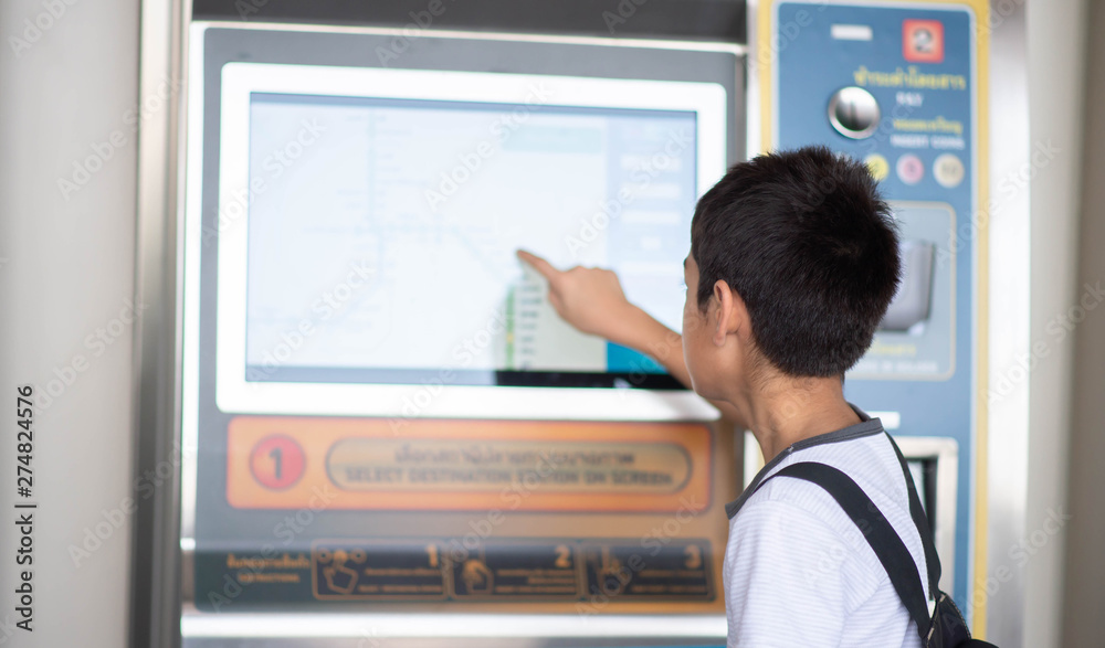 BANGKOK, THAILAND - JUNE 22, 2019: Student Passenger by BTS automatice machine ticket to entrance in subway station. BANGKOK, THAILAND - JUNE 22, 2019: Student Passenger by BTS automatice machine ticket to entrance in subway station.
