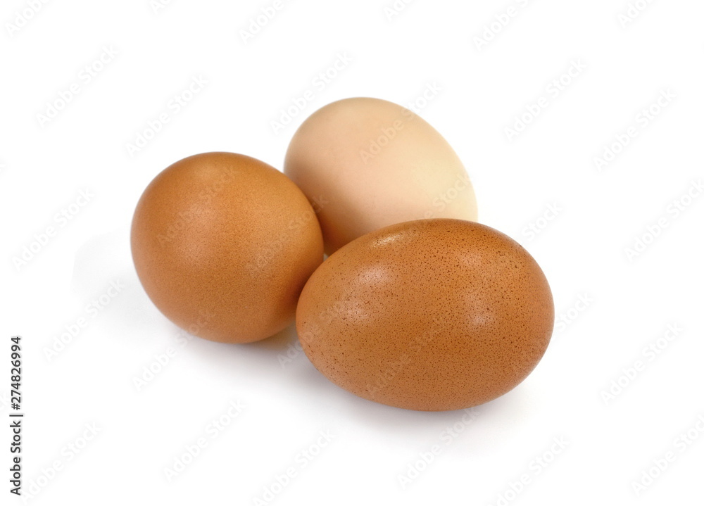 Raw Eggs on White Background. Brown and white eggs. Raw Eggs on White Background. Brown and white eggs.