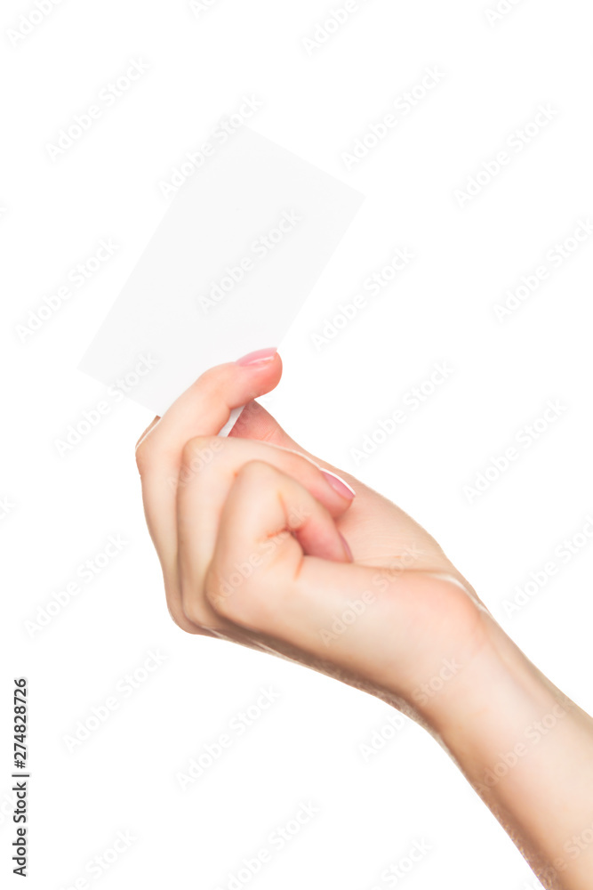 Empty sheet of paper in female hand with manicure isolated on white Empty sheet of paper in female hand with manicure isolated on white
