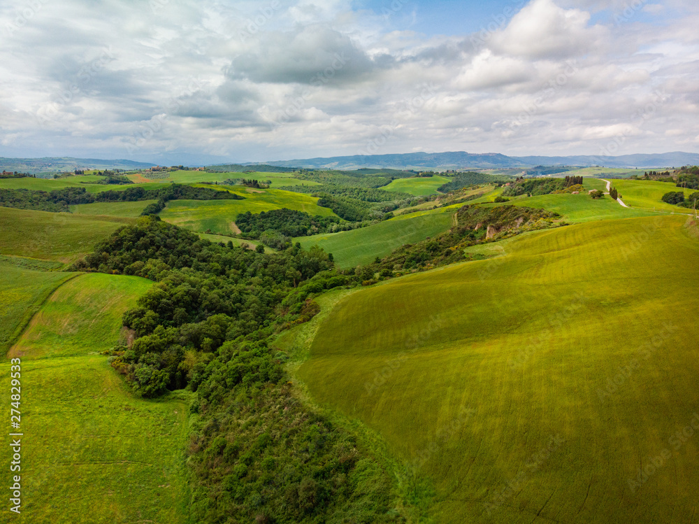 Typical landscape of the Val d'Orcia in Tuscany, Italy. Aerial v