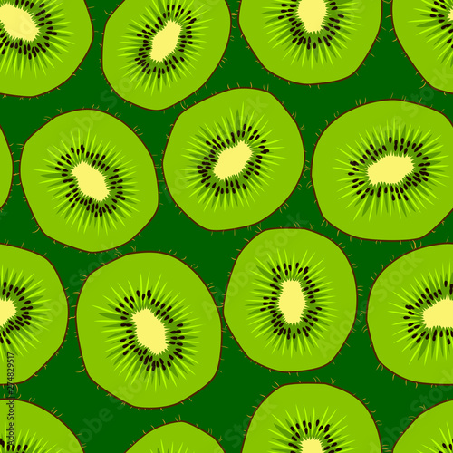 Kiwi seamless pattern. Endless ornament with kiwifruit in cut on the dark green background. Green slice of kiwi fruit. Bright color background with fruit.