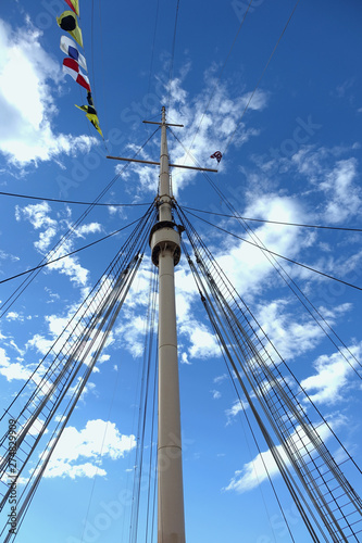 Ship's Mast With Flags And Crow's Nest