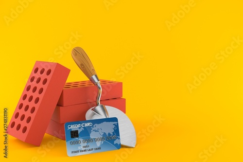 Trowel and bricks with credit card