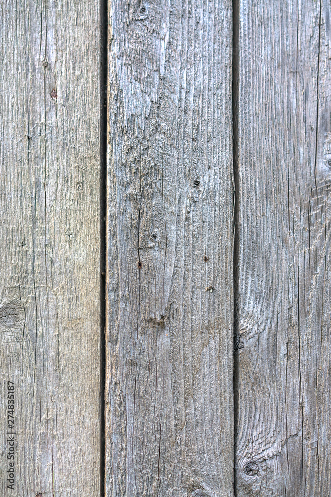 Dark wooden boards, planks. Naturally aged wood. Natural wooden background.