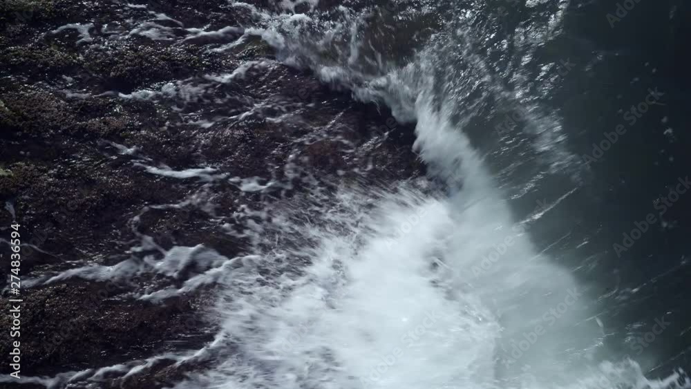 Top view of ocean wave and white sea foam. Top view of ocean wave and white sea foam.