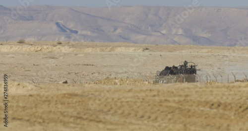 Israeli Army personal carrier on border Idf Army personal carrier in training, Negev desert, Israel photo