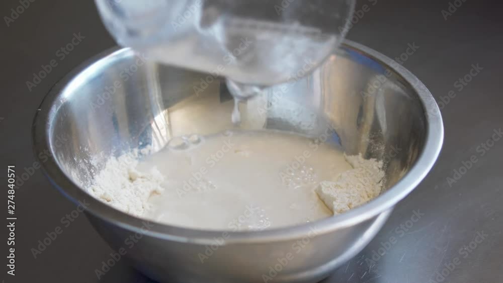 Preparing a mixture of masa flour, water, and salt for masa (corn) tortillas. Homemade, traditional, simple and fresh recipe. Preparing a mixture of masa flour, water, and salt for masa (corn) tortillas. Homemade, traditional, simple and fresh recipe.