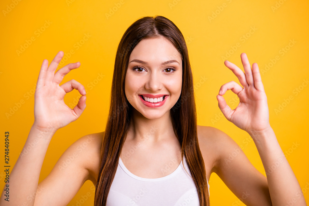 Close up photo beautiful amazing she her lady positive good job hands arms okey symbol agreement advise low price buy buyer quality product wear casual white tank-top isolated bright yellow background Close up photo beautiful amazing she her lady positive good job hands arms okey symbol agreement advise low price buy buyer quality product wear casual white tank-top isolated bright yellow background