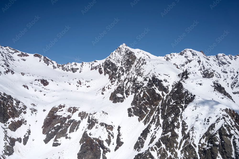 late spring snow on Cevedale peak range, Alps,  Italy