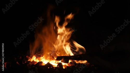 Blacksmith forge with flaming fire looking like a monster`s maw in an old smithy   photo