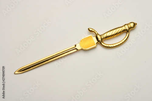 Photography Envelope opener made of silver or brass with gold plating.