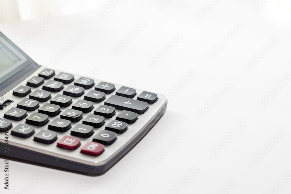 Isolated calculator on the white background. Isolated calculator on the white background.