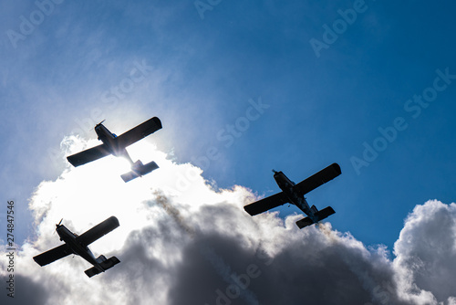 Airplanes on airshow. Aerobatic team performs flight at air show in Krakow, Poland.