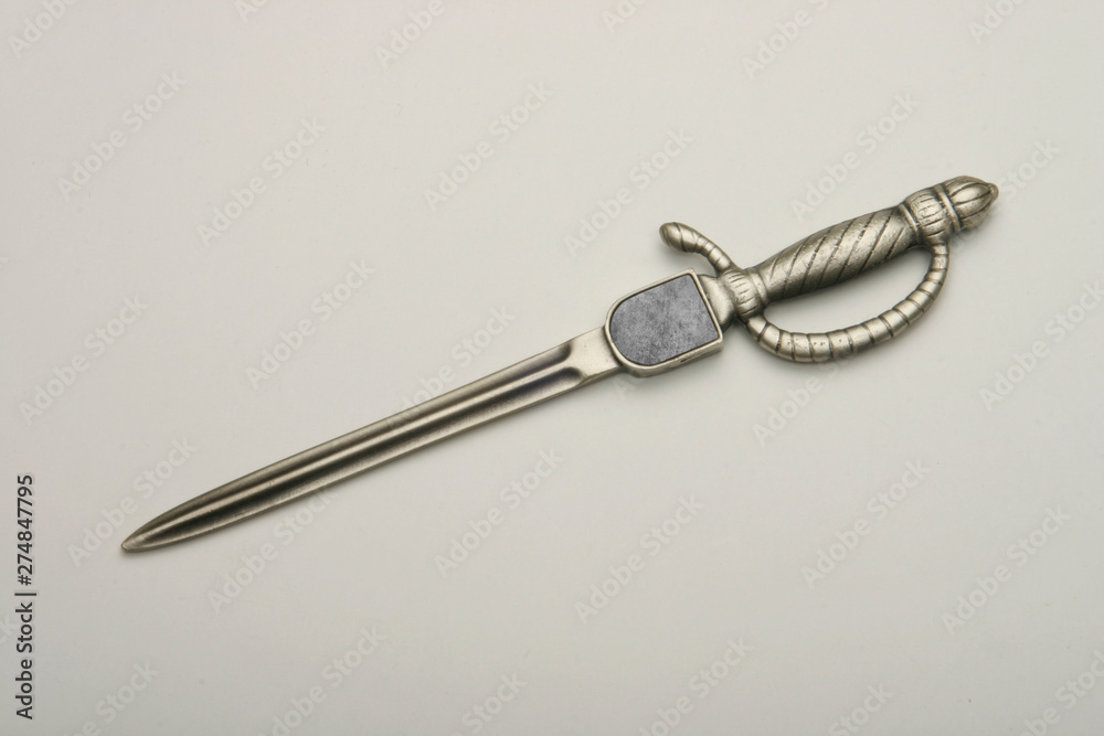 Envelope opener made of silver or brass with gold plating. Envelope opener made of silver or brass with gold plating.