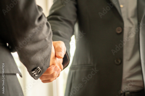 Businessman shaking hands each othor, business concept