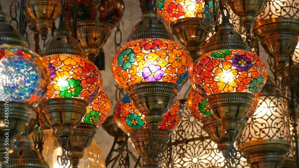 Multi-colored Turkish mosaic lamps on the ceiling market in the famous Grand Bazaar in Istanbul, Turkey Multi-colored Turkish mosaic lamps on the ceiling market in the famous Grand Bazaar in Istanbul, Turkey