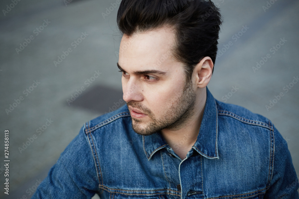 Fototapeta premium Close up portrait of young bearded man