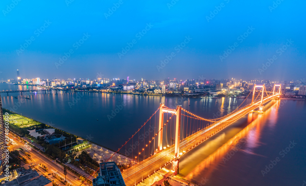 Island Yangtze river bridge. Located in wuhan, the largest city in central China. The Yangtze river is the longest river in China. Modern traffic background.