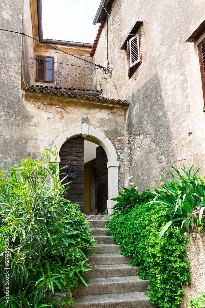 stairs and gate in historical town Moscenicka Draga, Croatia