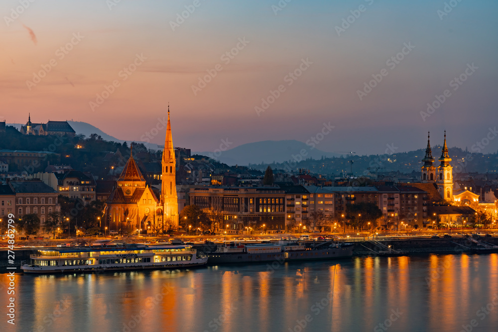 Night view of the Szilágyi Dezső Square Reformed Church and River Danube bank