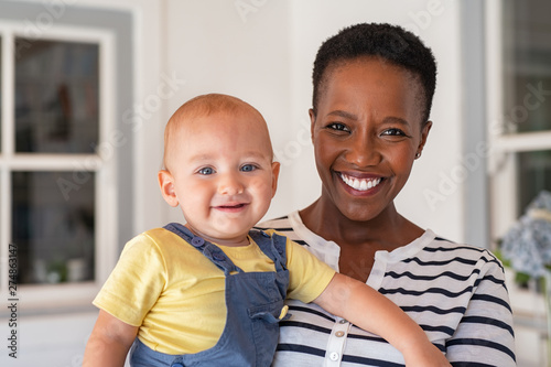 African nanny with baby boy photo