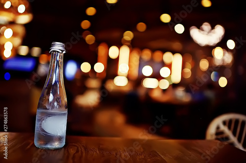 bottle of mineral water in the restaurant bokeh