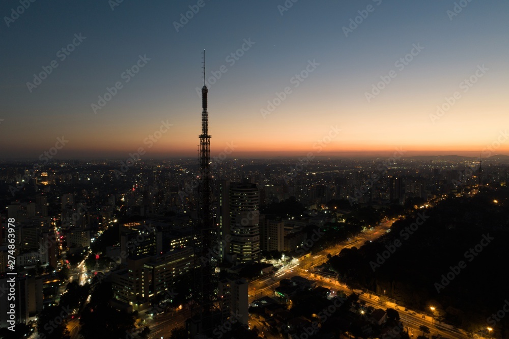 Sunset aerial view in São Paulo, Brazil. Great landscape. Explosion of colors on skyline. Business travel. Travel destination.