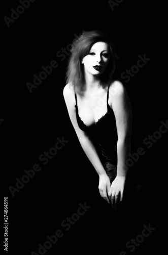 Beautiful Young woman as sexy vampire halloween portrait