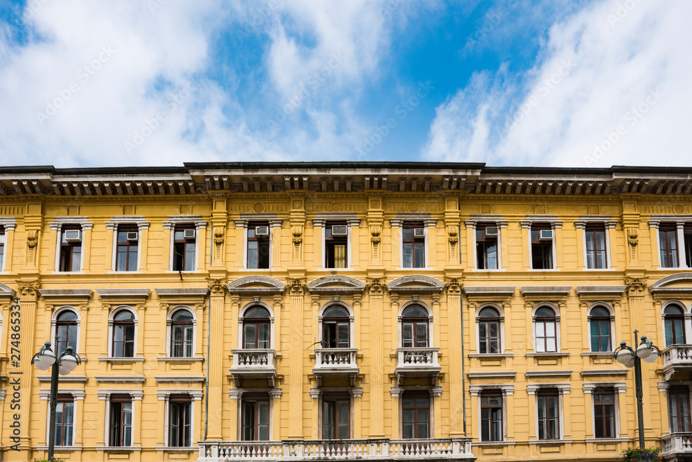 yellow building with balcony in Rijeka, Istria, Croatia