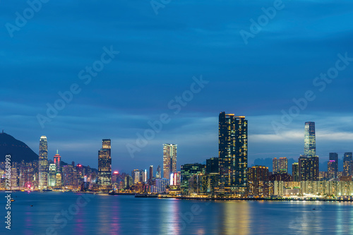 Panorama of Skyline of Victoria Harbor of Hong Kong city at dusk