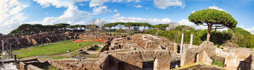Panoramic view of ruins of the thermal baths of Nettuno and the adjacent gyms located in the archaeological excavations of Ostia Antica in Rome - Italy