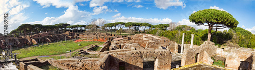 Panoramic view of ruins of the thermal baths of Nettuno and the adjacent gyms located in the archaeological excavations of Ostia Antica in Rome - Italy