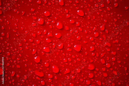Liquid droplet image on a red background