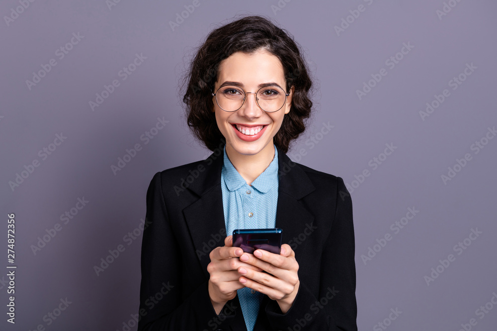 Portrait of cute pretty nice collar manager hold hand modern technology device wireless connection wavy curly hairdo hairstyle feel content satisfied dressed classy outfit isolated grey background Portrait of cute pretty nice collar manager hold hand modern technology device wireless connection wavy curly hairdo hairstyle feel content satisfied dressed classy outfit isolated grey background