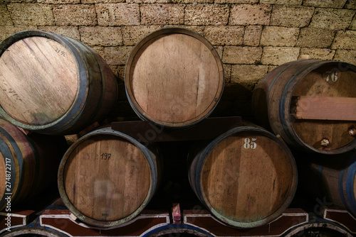 Wine cellar with oak barrels