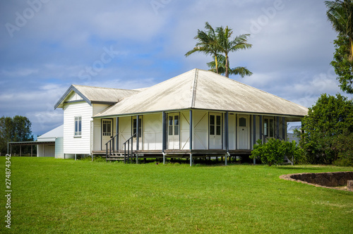 A small, Australian style farmhouse with wooden sidings and tin roof from approximately the 1930s, Byron Bay © byharald