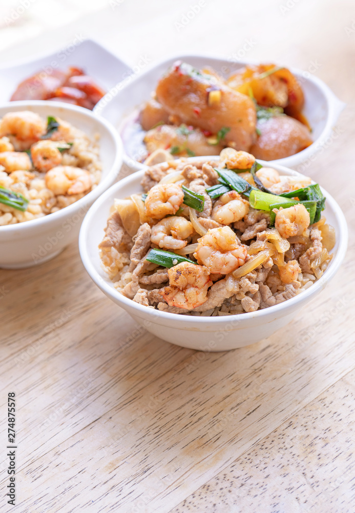 Braised shrimp over rice - Taiwan famous traditional street food. Soy-stewed prawn on cooked rice. Travel concept, top view, copy space, close up Braised shrimp over rice - Taiwan famous traditional street food. Soy-stewed prawn on cooked rice. Travel concept, top view, copy space, close up