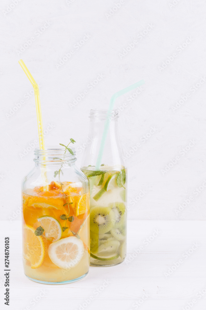 Bottles of fruit drink on table Bottles of fruit drink on table