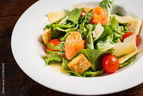 caesar salad with salmon fish