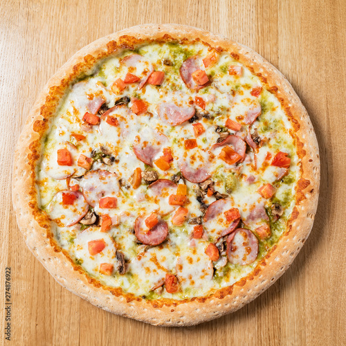 italian pizza on the wooden background