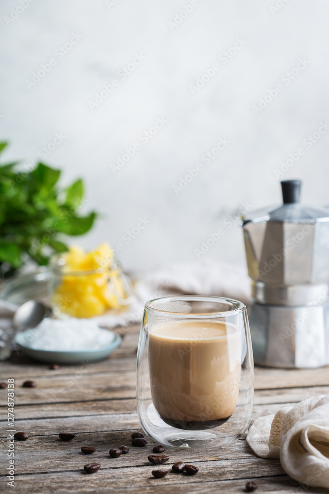 Keto, ketogenic bulletproof coffee with coconut oil and ghee butter