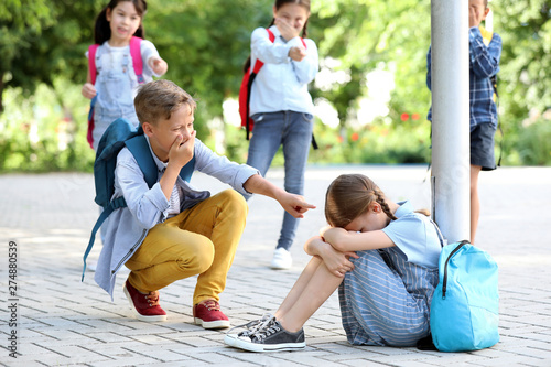 Bullied little girl with ag...