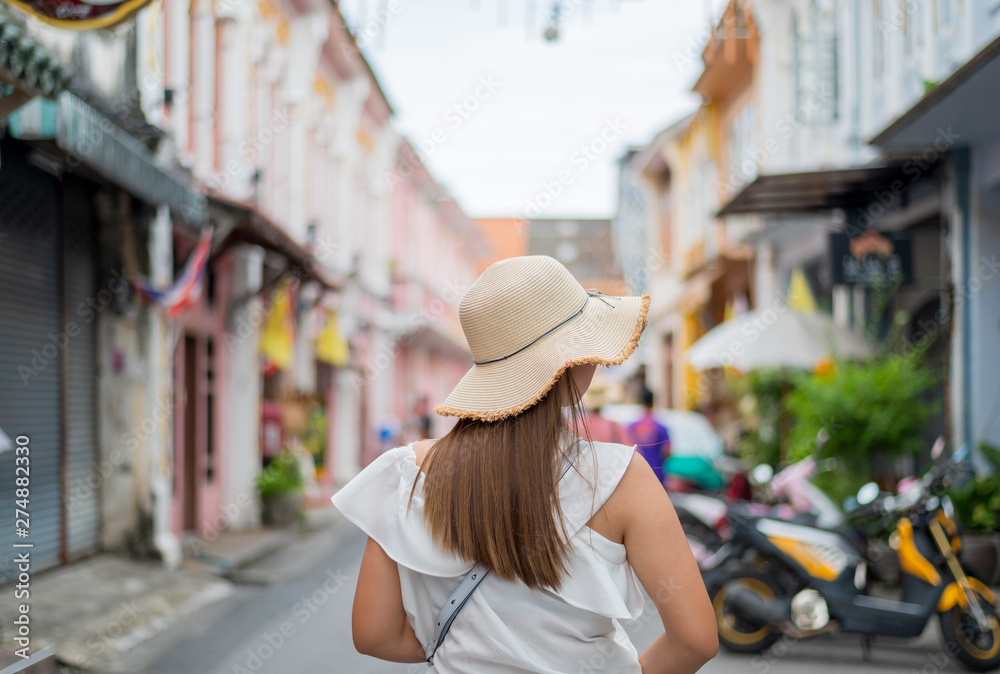 young woman in the old town of Phuket city in Thailand,Travel concept background