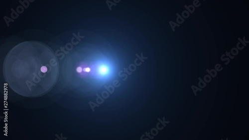 Horizontal Moving lens flare effect on black background. 4k animation.
