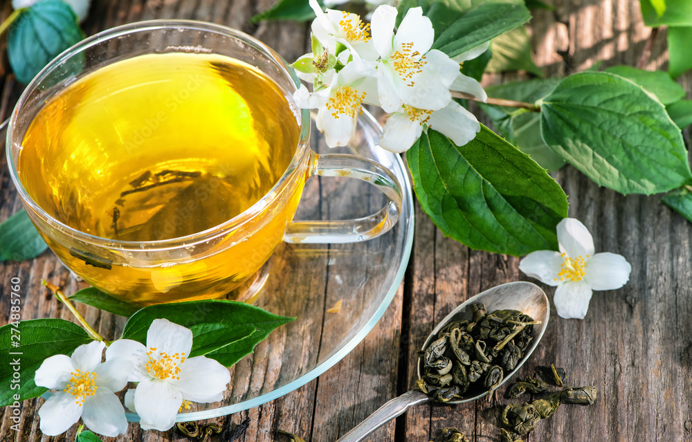 Cup of green tea with jasmine Cup of green tea with jasmine