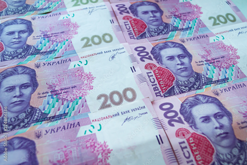 Obraz premium Ukrainian currency. Two hundred hryvnia background