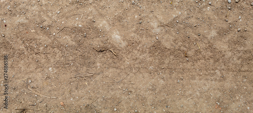 Brownish Dirt Road Texture With Tractor Wheel Embossed