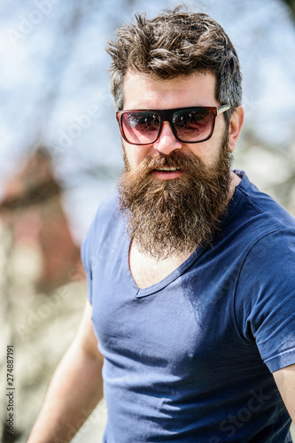 Mature hipster with beard. brutal male with perfect style. bearded man with lush hair. Free and happy time. summer fashion and beauty. Bearded man outdoor. Beard care and barbershop. Got to shave