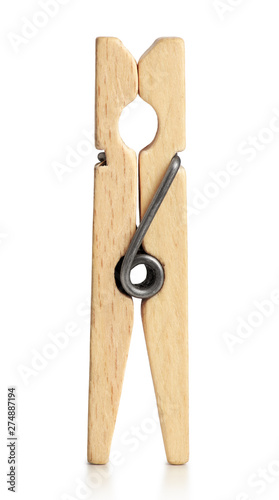 Wooden clothespin for clothes closeup on isolated white background